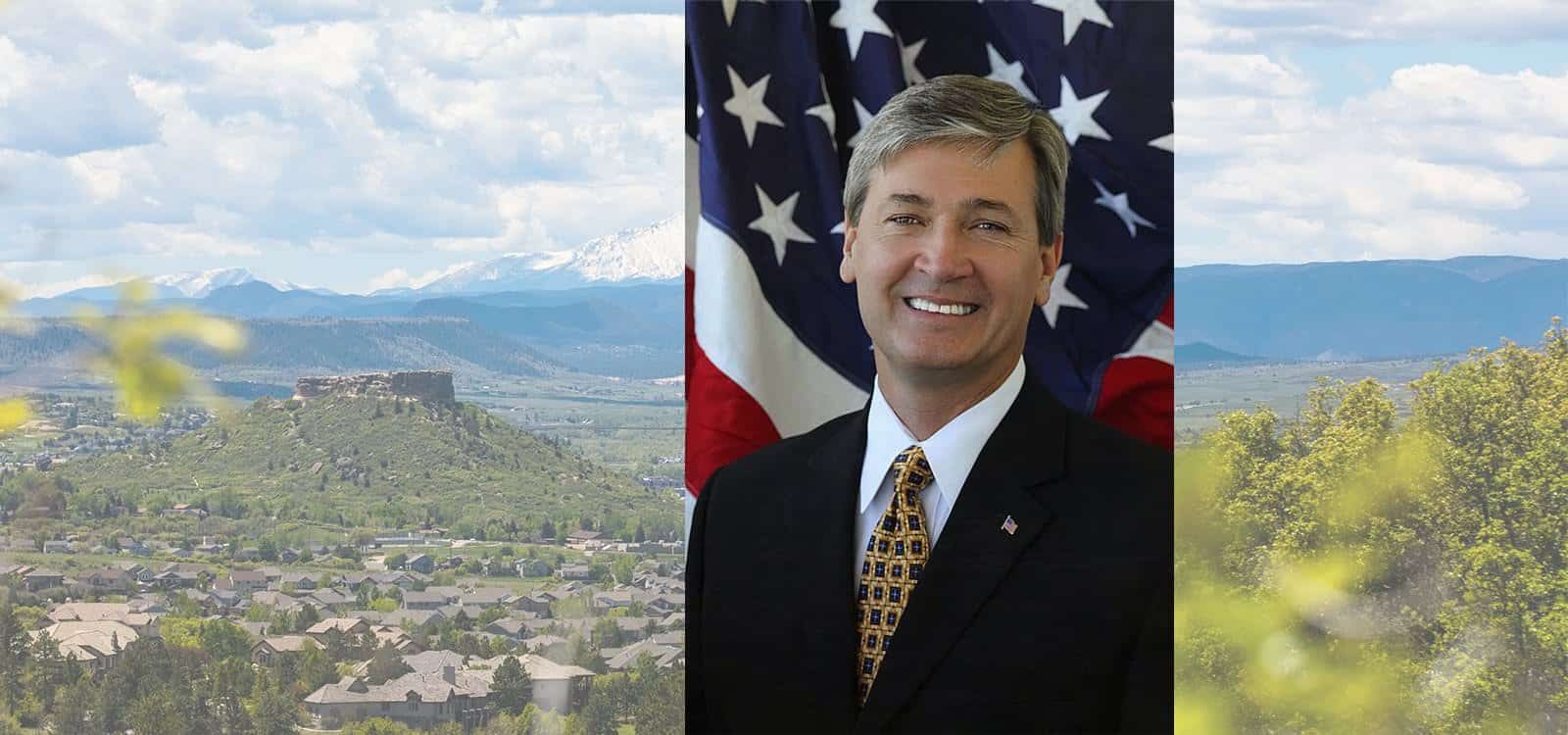 Commissioner Partridge head shot scenic background
